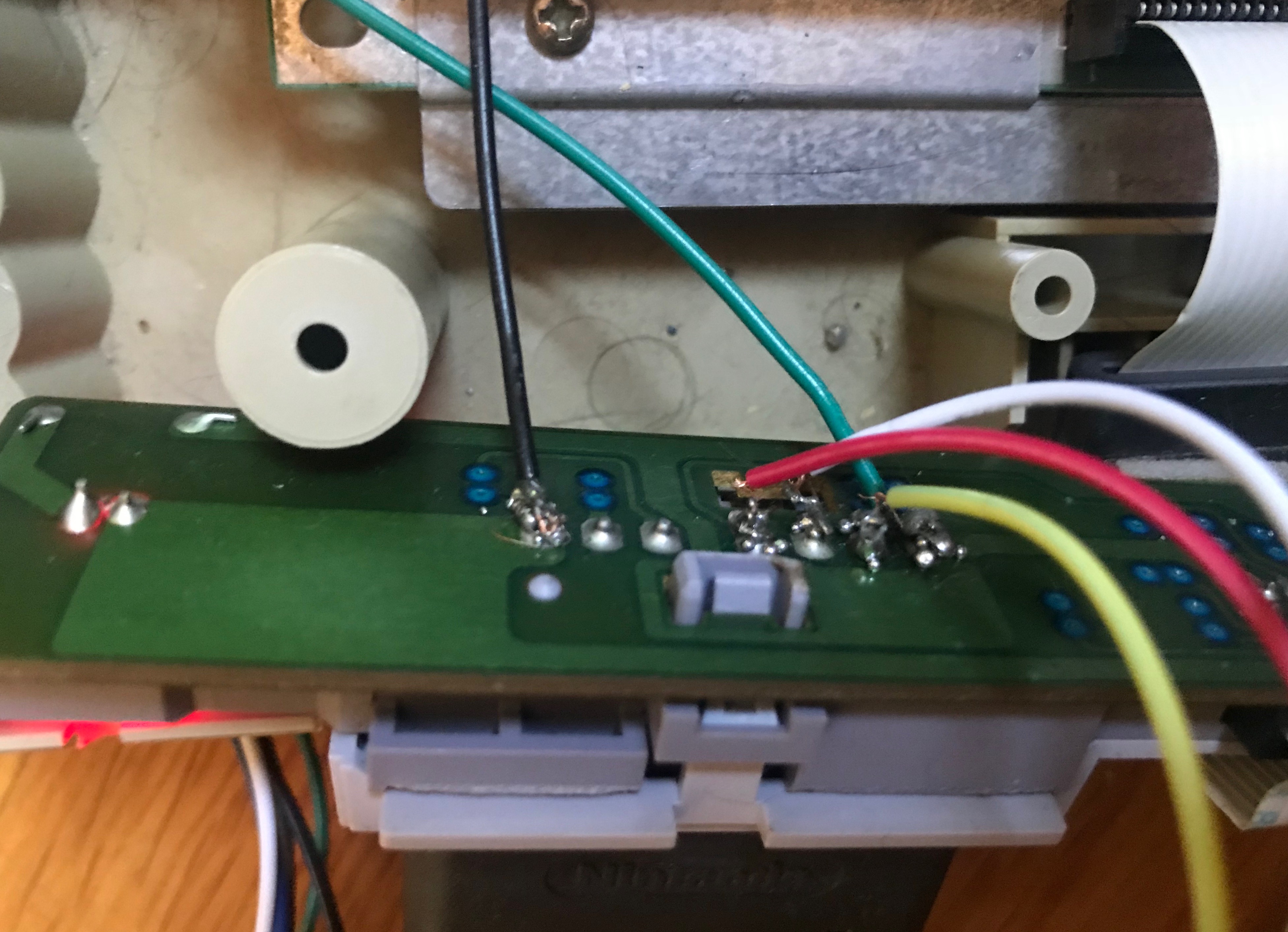 Wires soldered to the back of an SNES controller port